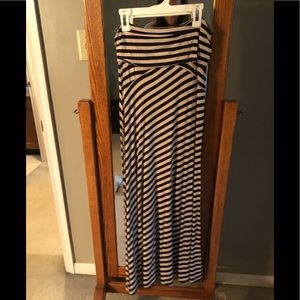 Navy blue and tan long stretch skirt with wife waste band